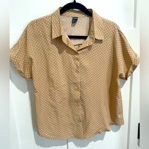 Tan and white polkadot shirt
